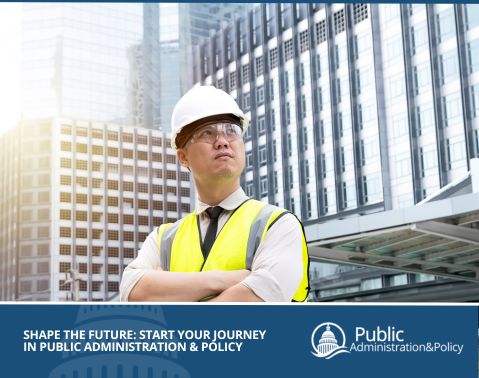 Certified project manager in a yellow vest inspecting buildings, symbolizing the role of FAC-P/PM certification in overseeing federal construction projects