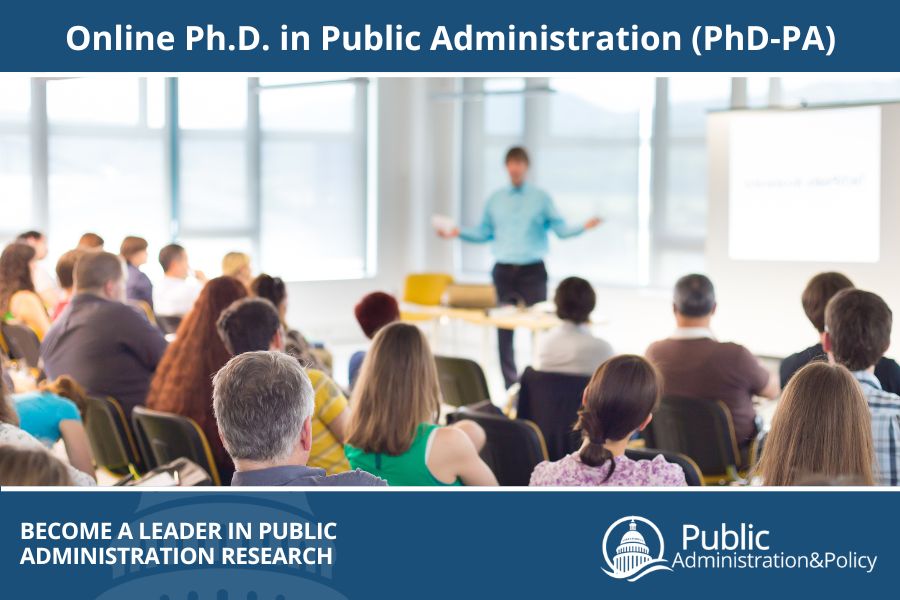 An instructor giving a presentation in front of a group of students, symbolizing the Ph.D. in Public Administration program