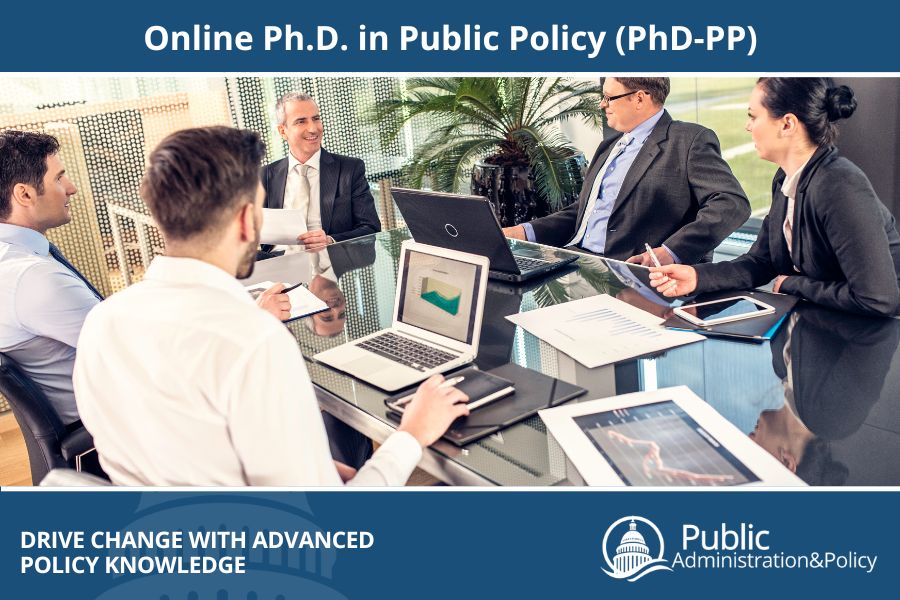 A group of public officials sitting around a conference with a student, representing the Ph.D. in Public Policy program