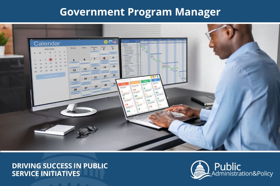 Government program manager at a desk with three computer screens